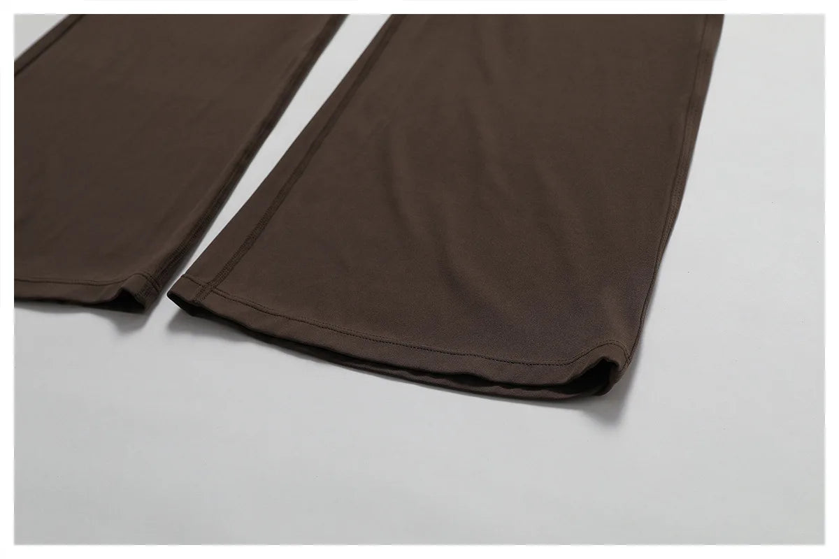 THE NOIR – OPEN BACK FLARE JUMPSUIT