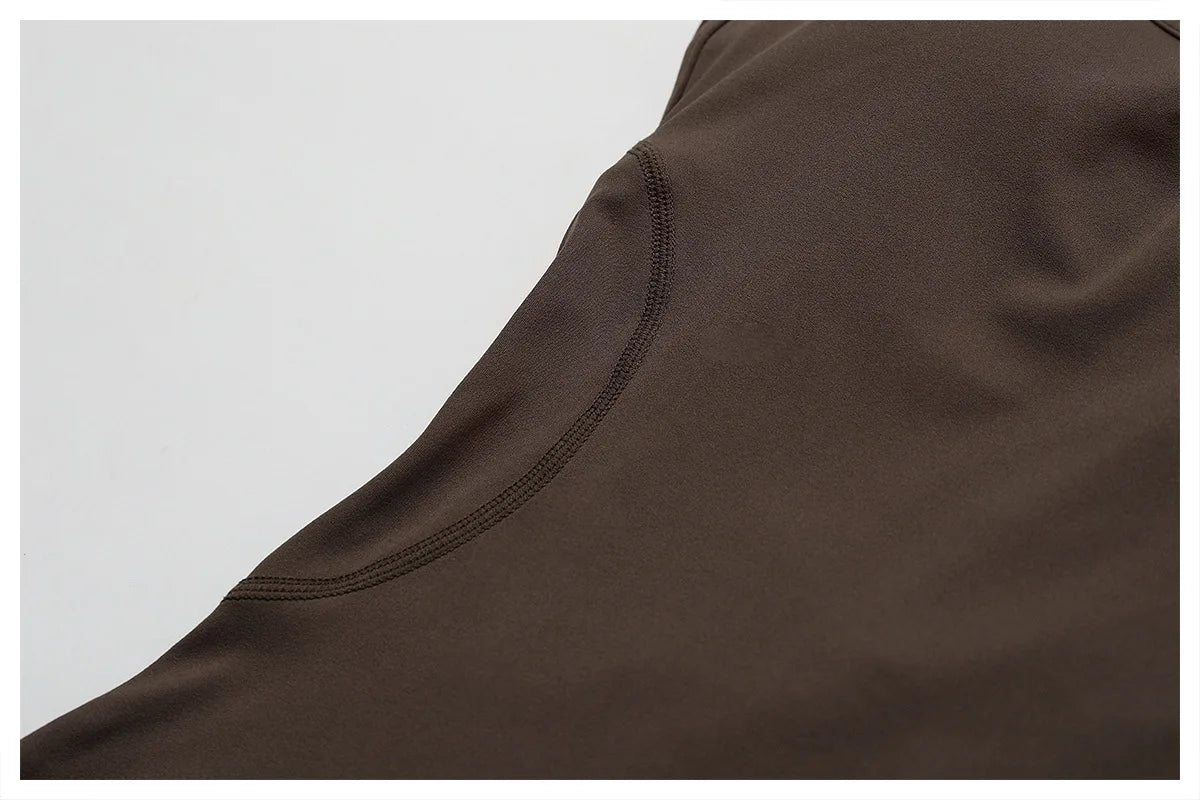 THE NOIR – OPEN BACK FLARE JUMPSUIT